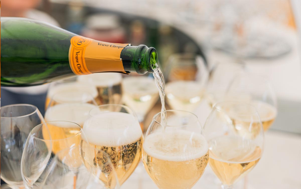 champagne pouring at london concours