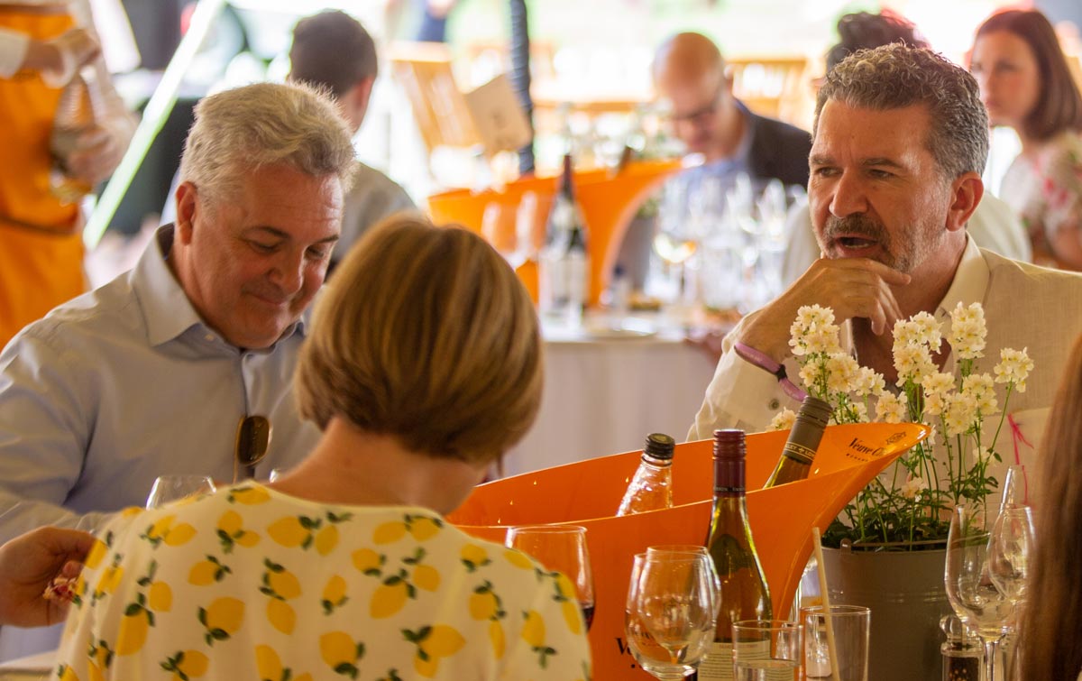 people eating at london concours